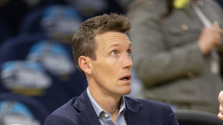 Oct 27, 2024; San Francisco, California, USA; Golden State Warriors general manager Mike Dunleavy chats courtside before his team takes on the Los Angeles Clippers at Chase Center. Mandatory Credit: D. Ross Cameron-Imagn Images