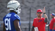 Buffalo Bills defensive coordinator Bobby Babich gives instructions for defensive tackle Ed Oliver during drills on day three of the Buffalo Bills training camp at St. John Fisher University in Pittsford, Friday, July 26, 2024.