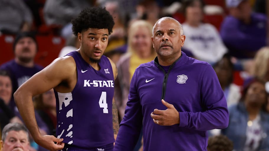 Kansas State coach Jerome Tang speaks with guard P.J. Haggerty against Arizona State.