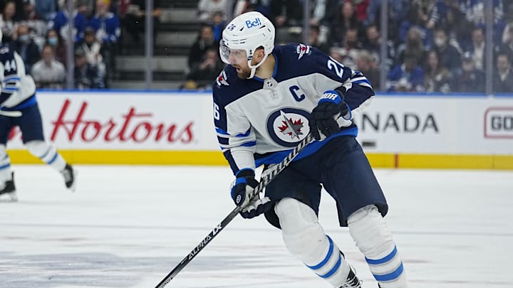 Mar 31, 2022; Toronto, Ontario, CAN; Winnipeg Jets forward Blake Wheeler (26) skates against the Toronto Maple Leafs during the second period at Scotiabank Arena. Mandatory Credit: John E. Sokolowski-Imagn Images