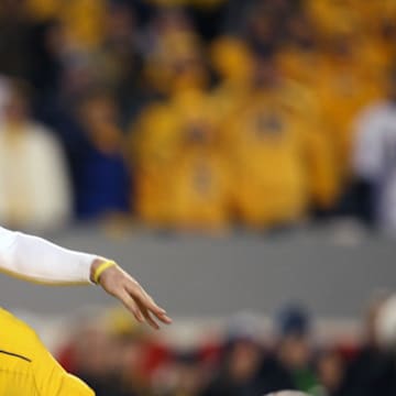 Former West Virginia specialist Pat McAfee has been inducted into the school Hall of Fame.