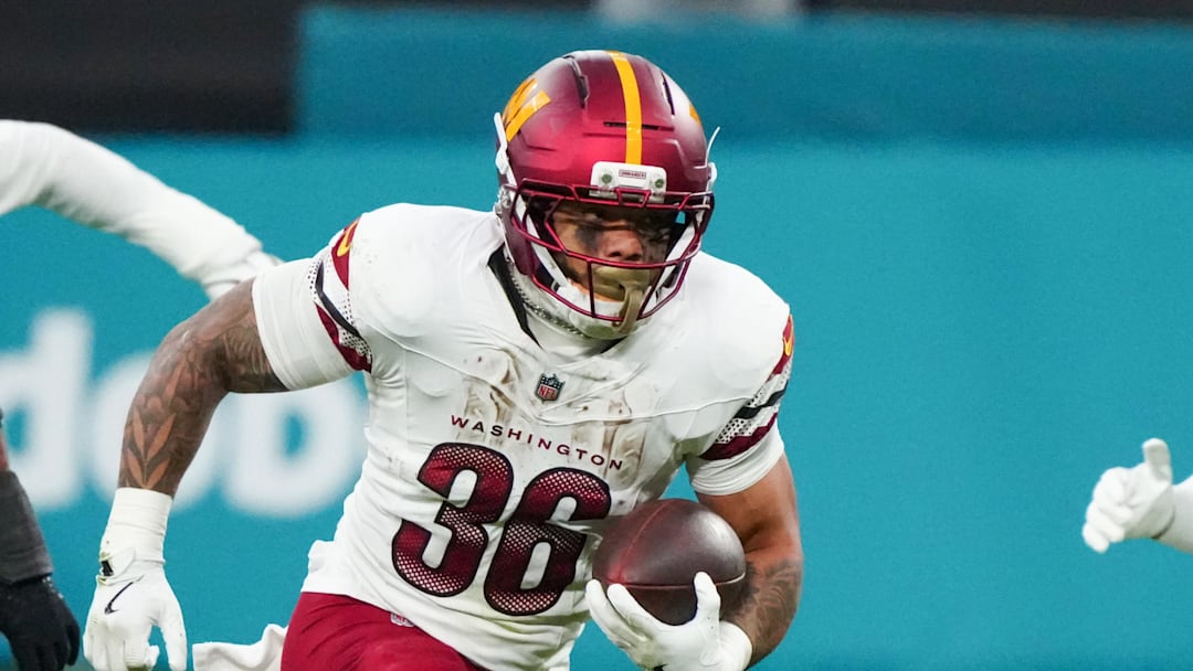 Washington Commanders running back Chris Rodriguez Jr. (36) carries the ball against the Miami Dolphins in the second quarter during the 2025 NFL Madrid Game at Santiago Bernabeu Stadium. Mandatory Credit: Kirby Lee-Imagn Images Washington Commanders running back Chris Rodriguez Jr. (36) carries the ball against the Miami Dolphins in the second quarter during the 2025 NFL Madrid Game at Santiago Bernabeu Stadium. Mandatory Credit: Kirby Lee-Imagn Images