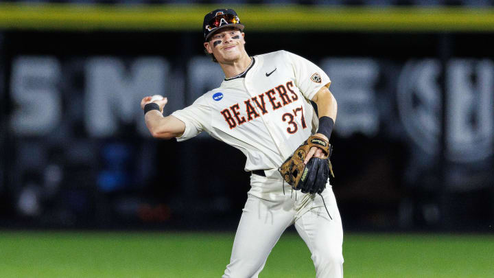 Jun 9, 2024; Lexington, KY, USA; Oregon State Beavers infielder Travis Bazzana (37) throws the ball during the second inning against the Kentucky Wildcats at Kentucky Proud Park. Mandatory Credit: Jordan Prather-USA TODAY Sports