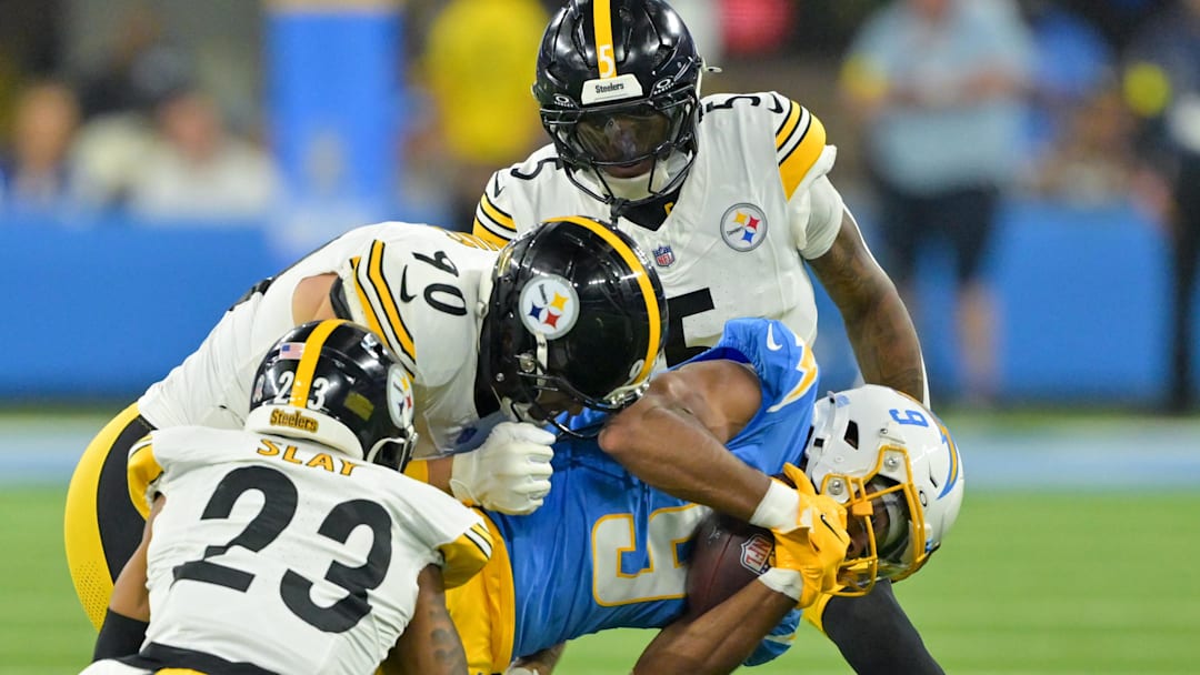 Former Pittsburgh Steelers cornerback Darius Slay (23) tackles Los Angeles Chargers wide receiver
