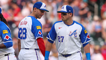 May 31, 2025; Atlanta, Georgia, USA; Atlanta Braves first baseman Matt Olson (28) and third baseman Austin Riley (27) celebrate after a victory over the Boston Red Sox at Truist Park. Mandatory Credit: Brett Davis-Imagn Images