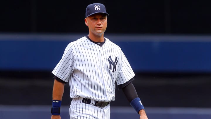 Sep 1, 2013; Bronx, NY, USA; New York Yankees designated hitter Derek Jeter (2) warms up before a game against the Baltimore Orioles at Yankee Stadium. Mandatory Credit: Brad Penner-USA TODAY Sports