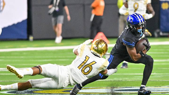 Oct 8, 2022; Paradise, Nevada, USA; Notre Dame Fighting Irish safety Brandon Joseph (16) attempts to tackle BYU Cougars wide receiver Kody Epps (0) in the fourth quarter at Allegiant Stadium. Mandatory Credit: Matt Cashore-USA TODAY Sports