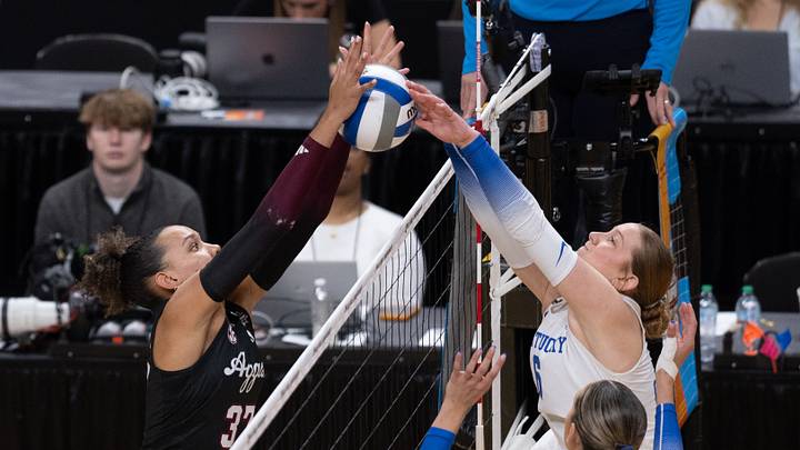 Dec 21, 2025; Kansas City, MO, USA; Texas A&M Aggies outside hitter Kyndal Stowers (37) defends Kentucky Wildcats setter Kassie OÕBrien (6) during the first set of the 2025 NCAA WomenÕs Volleyball Championship at T-Mobile Center.Mandatory Credit: Kylie Graham-Imagn Images Dec 21, 2025; Kansas City, MO, USA; Texas A&M Aggies outside hitter Kyndal Stowers (37) defends Kentucky Wildcats setter Kassie OÕBrien (6) during the first set of the 2025 NCAA WomenÕs Volleyball Championship at T-Mobile Center.Mandatory Credit: Kylie Graham-Imagn Images