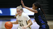 Army's Reese Ericson drives around Emmanuel College's Desiree Robinson during Monday's game on November 7, 2022.