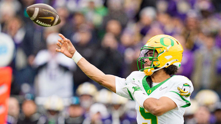 Oregon quarterback Dante Moore throws a pass as the Oregon Ducks take on the Washington Huskies on Nov. 29, 2025, at Husky Stadium in Seattle, Washington.