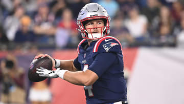 Aug 15, 2024; Foxborough, MA, USA; New England Patriots quarterback Bailey Zappe (4) looks to pass during the second half against the Philadelphia Eagles at Gillette Stadium. Mandatory Credit: Eric Canha-USA TODAY Sports