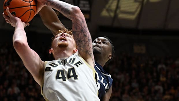 Nov 11, 2024; West Lafayette, Indiana, USA; Purdue Boilermakers center Will Berg (44) has a shot blocked by Yale Bulldogs 