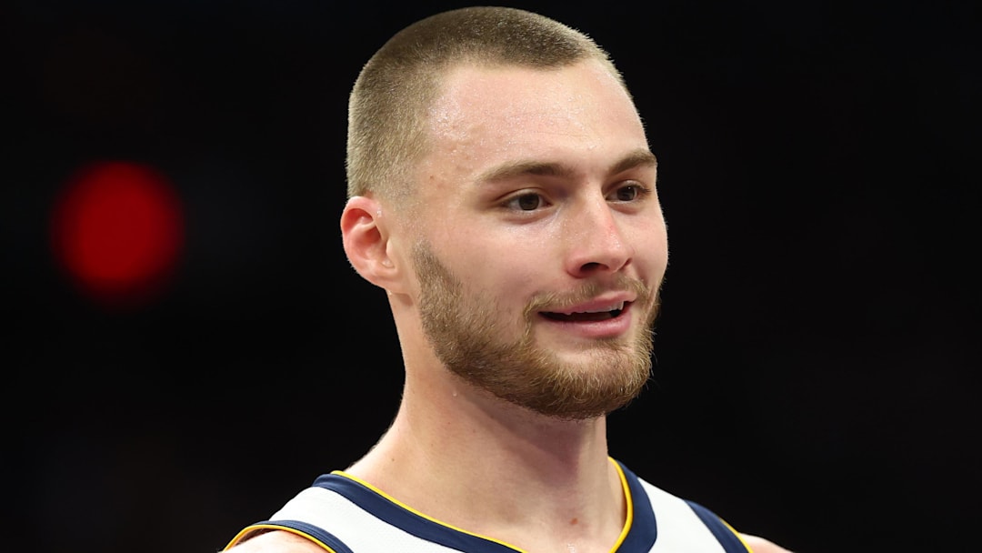Mar 24, 2026; Phoenix, Arizona, USA; Denver Nuggets guard Christian Braun (0) against the Phoenix Suns at Mortgage Matchup Center. Mandatory Credit: Mark J. Rebilas-Imagn Images