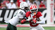 Oct 18, 2025; Bloomington, Indiana, USA; Indiana Hoosiers wide receiver Omar Cooper Jr. (3) runs after a catch against Michigan State Spartans defensive back Dontavius Nash (28) during the first half at Memorial Stadium. Mandatory Credit: Robert Goddin-Imagn Images
