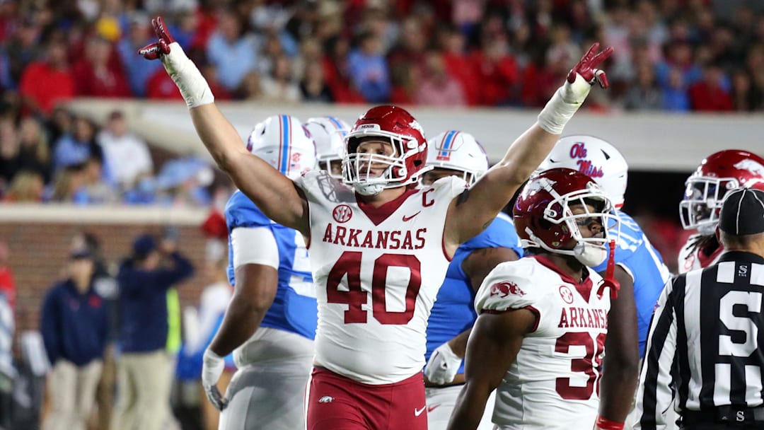 Oct 7, 2023; Oxford, Mississippi, USA; Arkansas Razorbacks defensive linemen Landon Jackson (40) reacts after a made field goal during the first half against the Mississippi Rebels at Vaught-Hemingway Stadium. Mandatory Credit: Petre Thomas-Imagn Images