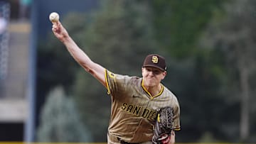 Sep 5, 2025; Denver, Colorado, USA; San Diego Padres relief pitcher Nick Pivetta (27) delivers a pitch in the first inning against the Colorado Rockies at Coors Field. Mandatory Credit: Ron Chenoy-Imagn Images
