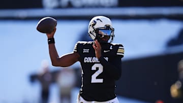 Nov 29, 2024; Boulder, Colorado, USA; Colorado Buffaloes quarterback Shedeur Sanders (2) prepares to pass the ball in the third quarter against the Oklahoma State Cowboys at Folsom Field. Mandatory Credit: Ron Chenoy-Imagn Images