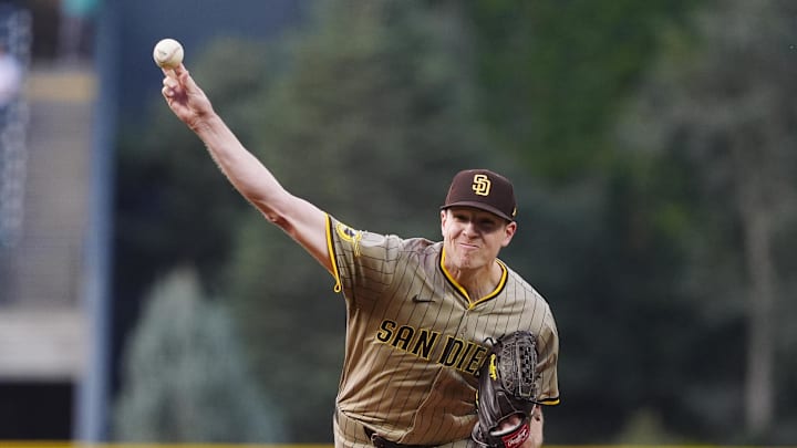 Sep 5, 2025; Denver, Colorado, USA; San Diego Padres relief pitcher Nick Pivetta (27) delivers a pitch in the first inning against the Colorado Rockies at Coors Field. Mandatory Credit: Ron Chenoy-Imagn Images
