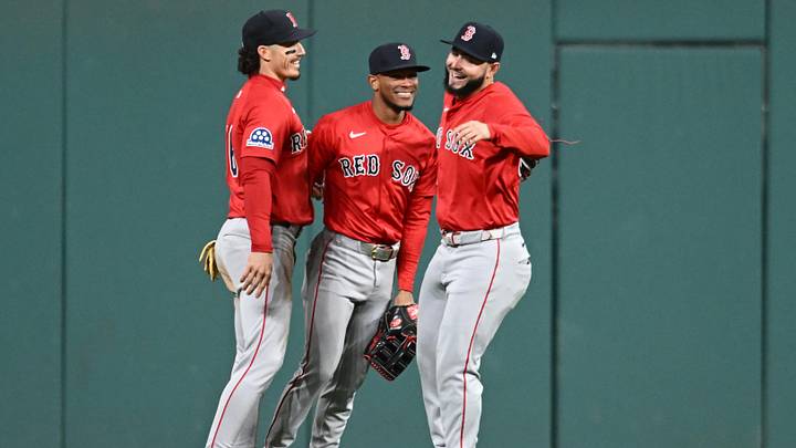 Apr 26, 2025; Cleveland, OH, USA; Boston Red Sox left fielder Jarren Duran (16) and center fielder Ceddanne Rafaela (3) and right fielder Wilyer Abreu (52) celebrate after the Red Sox beat the Cleveland Guardians at Progressive Field. Mandatory Credit: Ken Blaze-Imagn Images