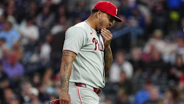 Philadelphia Phillies starting pitcher Taijuan Walker (99) reacts in the fifth inning against the Colorado Rockies at Coors Field.