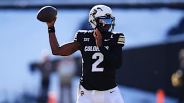 Nov 29, 2024; Boulder, Colorado, USA; Colorado Buffaloes quarterback Shedeur Sanders (2) prepares to pass the ball in the third quarter against the Oklahoma State Cowboys at Folsom Field. Mandatory Credit: Ron Chenoy-Imagn Images