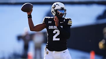 Nov 29, 2024; Boulder, Colorado, USA; Colorado Buffaloes quarterback Shedeur Sanders (2) prepares to pass the ball in the third quarter against the Oklahoma State Cowboys at Folsom Field. Mandatory Credit: Ron Chenoy-Imagn Images