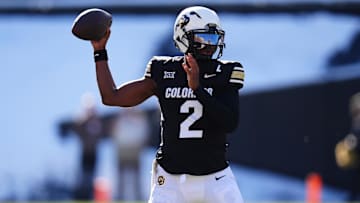 Nov 29, 2024; Boulder, Colorado, USA; Colorado Buffaloes quarterback Shedeur Sanders (2) prepares to pass the ball in the third quarter against the Oklahoma State Cowboys at Folsom Field. Mandatory Credit: Ron Chenoy-Imagn Images