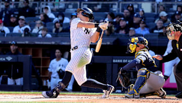 New York Yankees shortstop Anthony Volpe follows through on a solo home run against the Milwaukee Brewers.