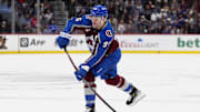Jan 14, 2025; Denver, Colorado, USA; Colorado Avalanche right wing Mikko Rantanen (96) shoots the puck in the second period against the New York Rangers at Ball Arena. Mandatory Credit: Ron Chenoy-Imagn Images