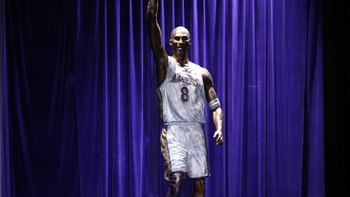 Feb 8, 2024; Los Angeles, CA, USA; A statue for former Los Angeles Lakers guard Kobe Bryant is unveiled during a ceremony at Star Plaza outside of Crypto.com ArenaMandatory Credit: Jason Parkhurst-USA TODAY Sports