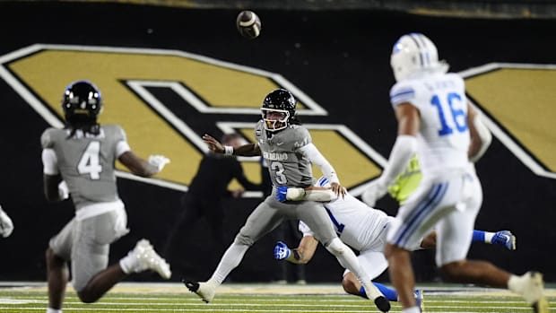 Colorado Buffaloes quarterback Kaidon Salter (3) throws an interception in the fourth quarter against the Brigham Young Couga