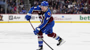 Jan 14, 2025; Denver, Colorado, USA; Colorado Avalanche right wing Mikko Rantanen (96) shoots the puck in the second period against the New York Rangers at Ball Arena. Mandatory Credit: Ron Chenoy-Imagn Images