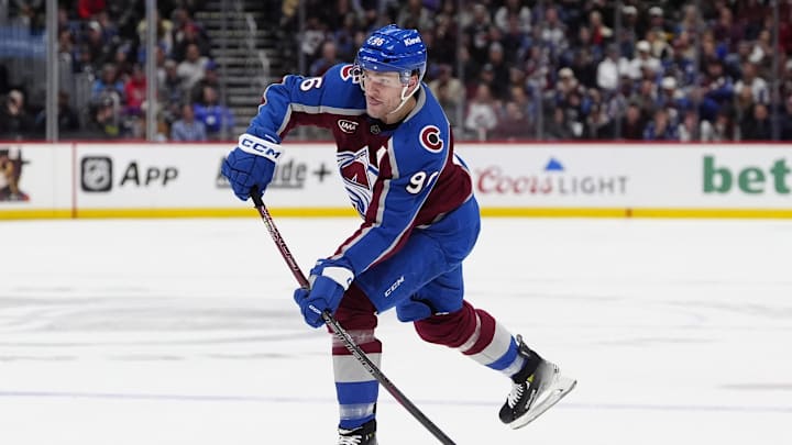 Jan 14, 2025; Denver, Colorado, USA; Colorado Avalanche right wing Mikko Rantanen (96) shoots the puck in the second period against the New York Rangers at Ball Arena. Mandatory Credit: Ron Chenoy-Imagn Images Jan 14, 2025; Denver, Colorado, USA; Colorado Avalanche right wing Mikko Rantanen (96) shoots the puck in the second period against the New York Rangers at Ball Arena. Mandatory Credit: Ron Chenoy-Imagn Images