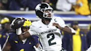 Oct 26, 2024; Ann Arbor, Michigan, USA;  Michigan State Spartans quarterback Aidan Chiles (2) passes in the second half against the Michigan Wolverines at Michigan Stadium. Mandatory Credit: Rick Osentoski-Imagn Images
