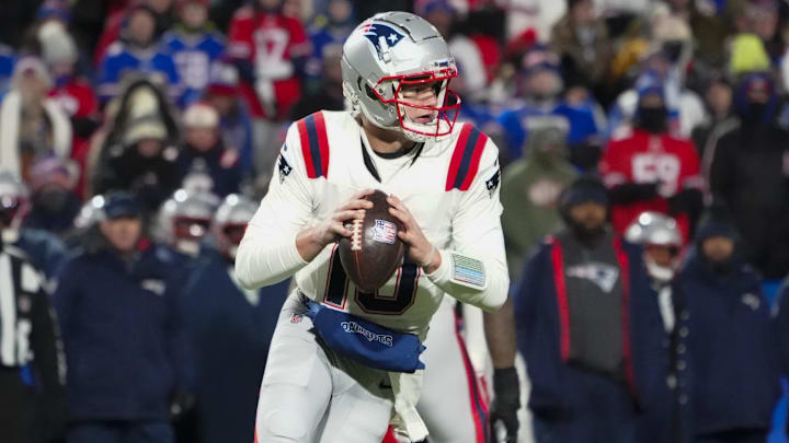 Dec 22, 2024; Orchard Park, New York, USA; New England Patriots quarterack Drake Maye (10) looks to throw the ball against the Buffalo Bills during the second half at Highmark Stadium. Mandatory Credit: Gregory Fisher-Imagn Images