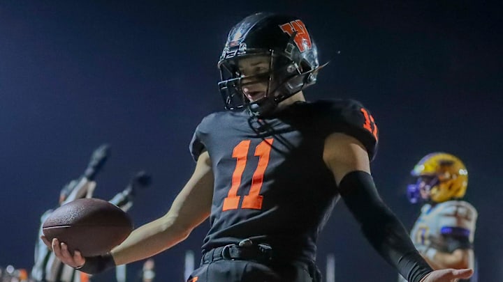 West De Pere High School's Braylon Stegall (11) celebrates after catching a touchdown pass against Rice Lake High School during a WIAA Division 2 state semifinal on Friday, November 15, 2024, at Marshfield High School in Marshfield, Wis. Tork Mason/USA TODAY NETWORK-Wisconsin