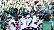 Oct 5, 2025; Philadelphia, Pennsylvania, USA; Philadelphia Eagles wide receivers A.J. Brown (11)] and Devonta Smith (6) reach for an incomplete pass on the final play of the game against the Denver Broncos at Lincoln Financial Field. 