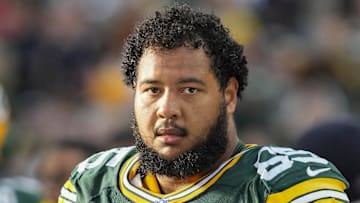 Sep 7, 2025; Green Bay, Wisconsin, USA;  Green Bay Packers guard Aaron Banks (65) during the game against the Detroit Lions at Lambeau Field. Mandatory Credit: Jeff Hanisch-Imagn Images