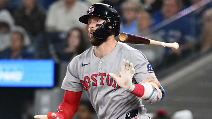Sep 23, 2025; Toronto, Ontario, CAN;  Boston Red Sox shortstop Trevor Story (10) hits a double against the Toronto Blue Jays in the fifth inning at Rogers Centre. Mandatory Credit: Dan Hamilton-Imagn Images Sep 23, 2025; Toronto, Ontario, CAN;  Boston Red Sox shortstop Trevor Story (10) hits a double against the Toronto Blue Jays in the fifth inning at Rogers Centre. Mandatory Credit: Dan Hamilton-Imagn Images