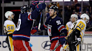 Dec 6, 2024; New York, New York, USA; New York Rangers right wing Reilly Smith (91) celebrates his goal against the Pittsburgh Penguins with left wing Chris Kreider (20) during the third period at Madison Square Garden. Mandatory Credit: Brad Penner-Imagn Images