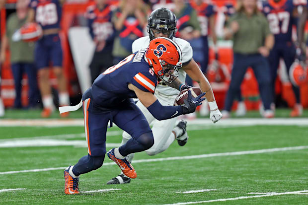 Syracuse Orange defensive back Justin Barron intercepts a pass against the Army Black Knights.