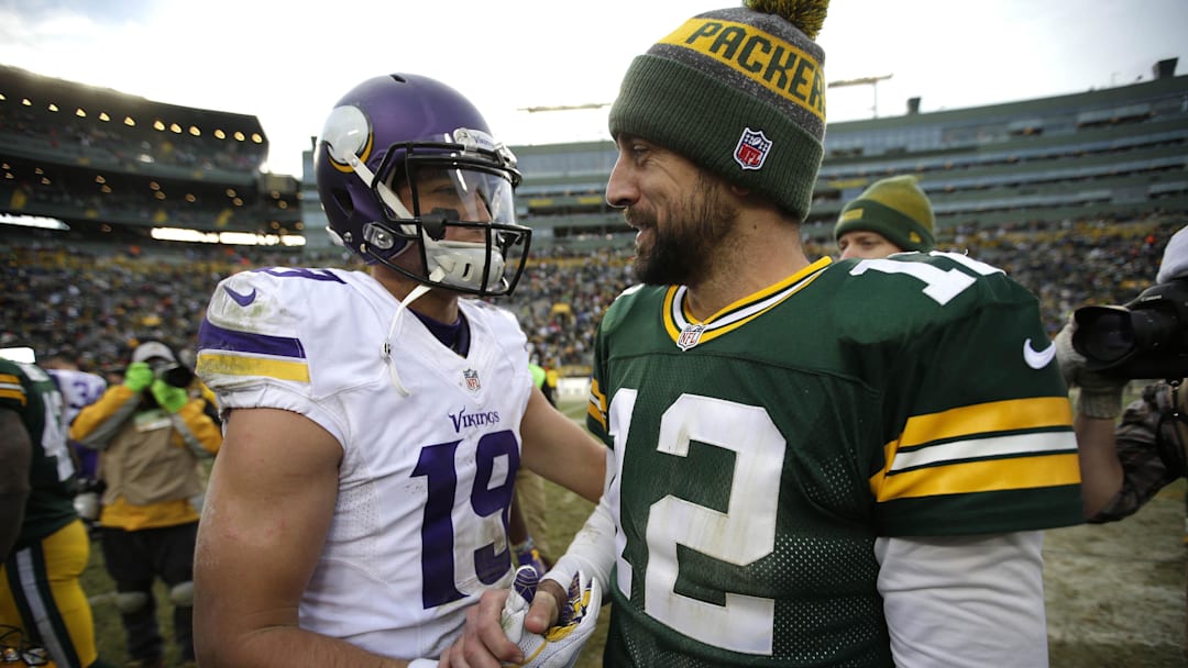 Dec 24, 2016; Green Bay, WI, USA; Green Bay Packers quarterback Aaron Rodgers (12) shakes hands with Minnesota Vikings wide receiver Adam Thielen (19) at Lambeau Field.  Mandatory Credit: Dan Powers/USA TODAY NETWORK-Wisconsin via Imagn Images