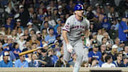 Sep 23, 2025; Chicago, Illinois, USA; New York Mets first baseman Pete Alonso (20) hits a RBI single against the Chicago Cubs during the sixth inning at Wrigley Field. Mandatory Credit: David Banks-Imagn Images