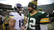 Dec 24, 2016; Green Bay, WI, USA; Green Bay Packers quarterback Aaron Rodgers (12) shakes hands with Minnesota Vikings wide receiver Adam Thielen (19) at Lambeau Field.  Mandatory Credit: Dan Powers/USA TODAY NETWORK-Wisconsin via Imagn Images
