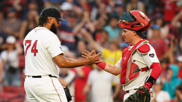 Jun 30, 2024; Boston, Massachusetts, USA; Boston Red Sox catcher Reese McGuire (3) congratulates relief pitcher Kenley Jansen (74) after defeating the San Diego Padres in nine innings at Fenway Park. Mandatory Credit: David Butler II-USA TODAY Sports