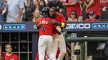 Jul 18, 2025; Cumberland, Georgia, USA; Atlanta Braves second baseman Ozzie Albies (1) reacts with left fielder Jurickson Profar (7) after hitting a three run home run against the New York Yankees during the third inning at Truist Park. Mandatory Credit: Dale Zanine-Imagn Images