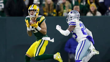 Green Bay Packers wide receiver Christian Watson (9) pulls down a touchdown reception against Dallas Cowboys cornerback DaRon Bland (26) in the fourth quarter during their football game Sunday, November 13, at Lambeau Field in Green Bay, Wis.

Dan Powers/USA TODAY NETWORK-Wisconsin