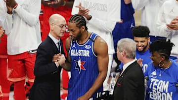 Feb 16, 2020; Chicago, Illinois, USA; NBA commissioner Adam Silver presents the Kobe Bryant MVP award to Team LeBron forward Kawhi Leonard of the LA Clippers after the 2020 NBA All Star Game at United Center. Mandatory Credit: Dennis Wierzbicki-Imagn Images