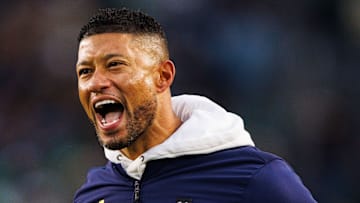 Notre Dame head coach Marcus Freeman celebrates a turnover during a NCAA college football game against Virginia at Notre Dame Stadium on Saturday, Nov. 16, 2024, in South Bend.