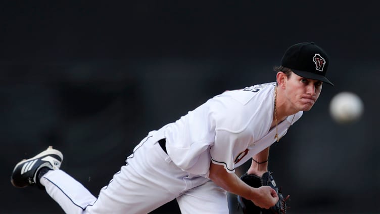 The Timber Rattlers    Justin Jarvis pitches against the Cedar Rapids Kernels Wednesday, Aug. 14,